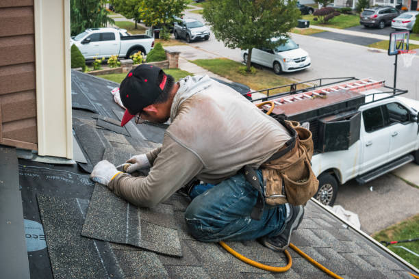 Professional Storm Damage Roof Repair technician working in Blain, PA